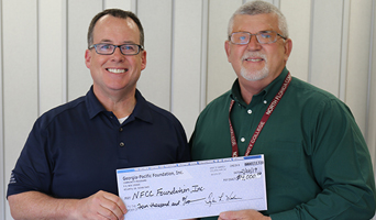 Scott Mixon presents check to Rick Davis February 2019