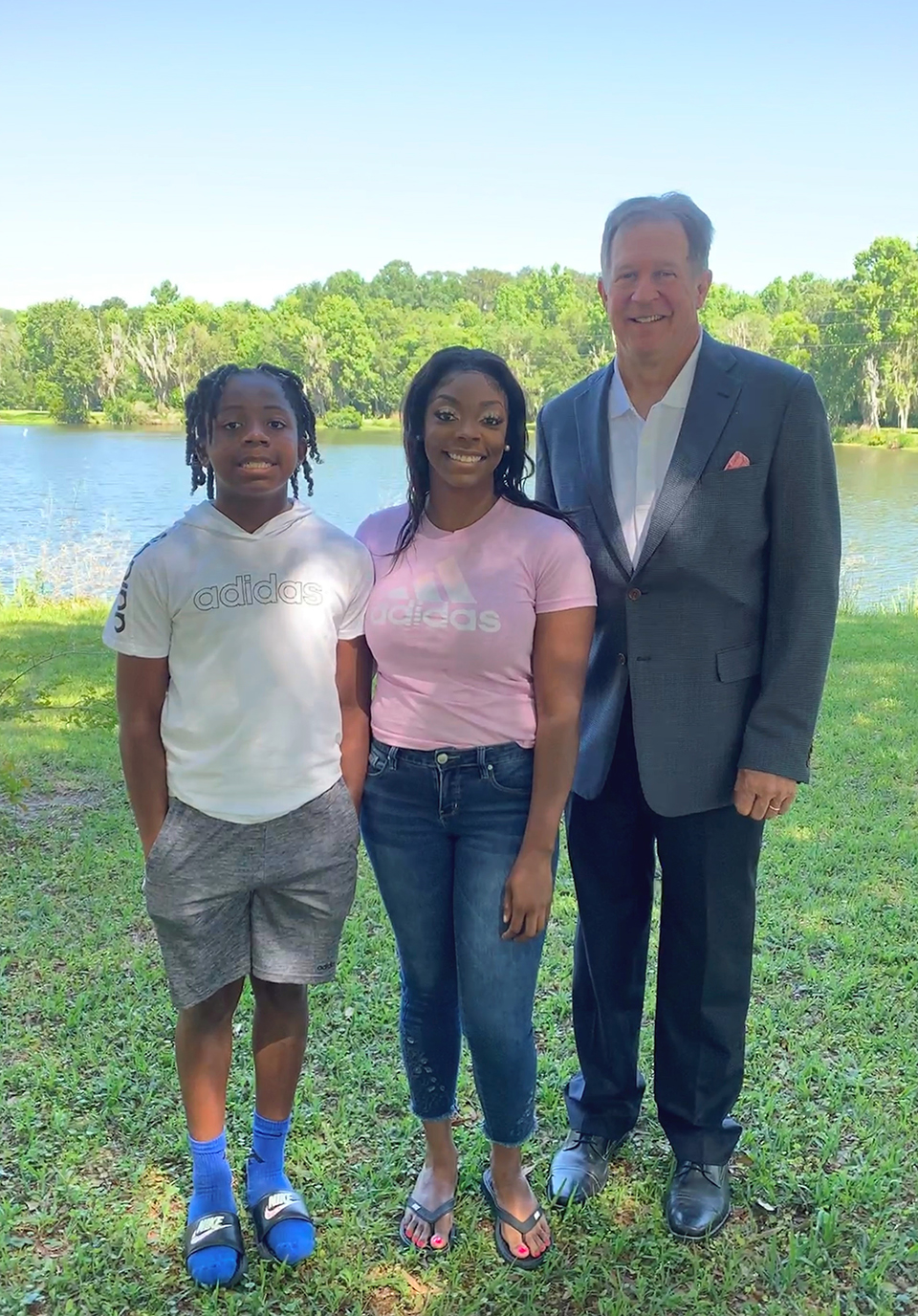 NFC student Taneeka Barfield, center, her son Travis, left, and Danny MacQuirter, right