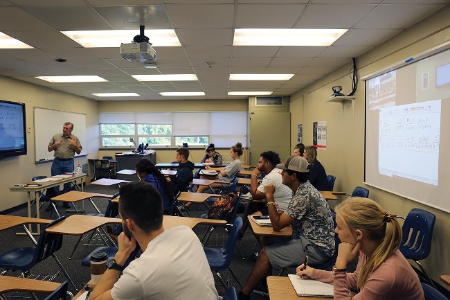 Professor Phillip Taylor teaching video conference class 2018