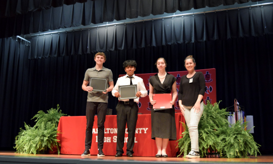 W.L. & Neta Carter Scholarship recipients Hayden Tabor, Jesus Martinez Gregorio, Sarah Armstrong and NFC Coordinator of Scholarships Brienna Valentine